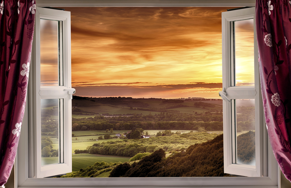 Image of a window opening up to a beautiful view symbolising a fresh perspective